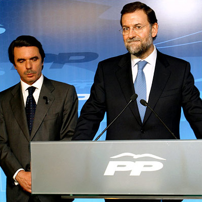 The outgoing Prime Minister Jos� Maria Aznar looks on as Mariano Rajoy, who was running as the Popular Party's candidate for prime minister, conceded defeat, Madrid, Spain, March 14, 2004.